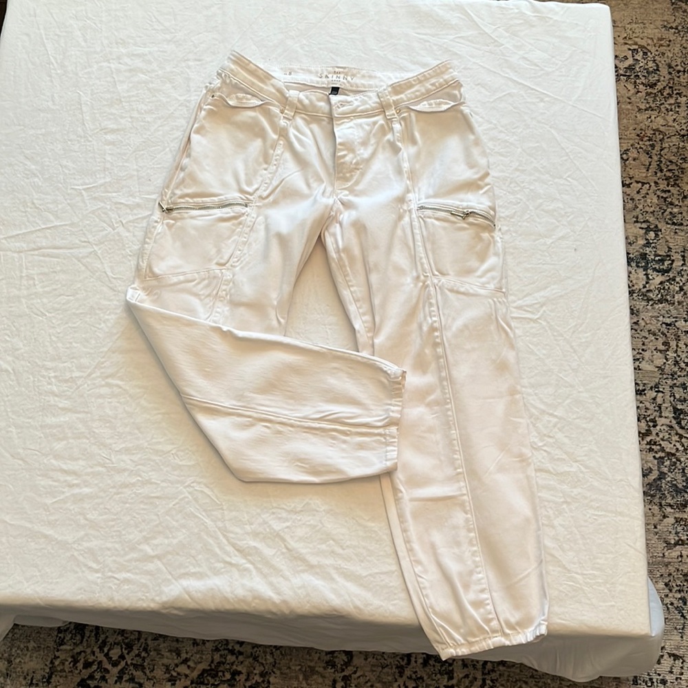 The Skinny Crop white jeans with silver buttons and zippers